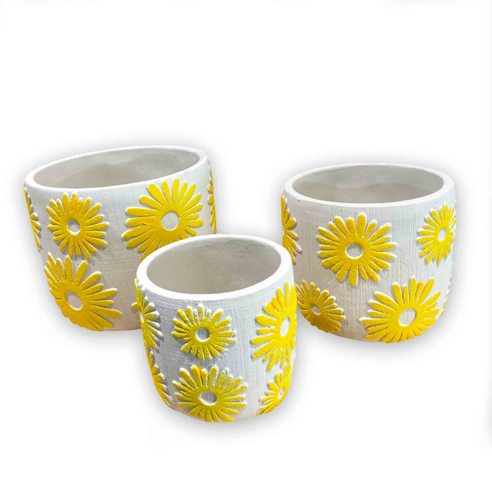Three ceramic planters with yellow flower designs on a white background
