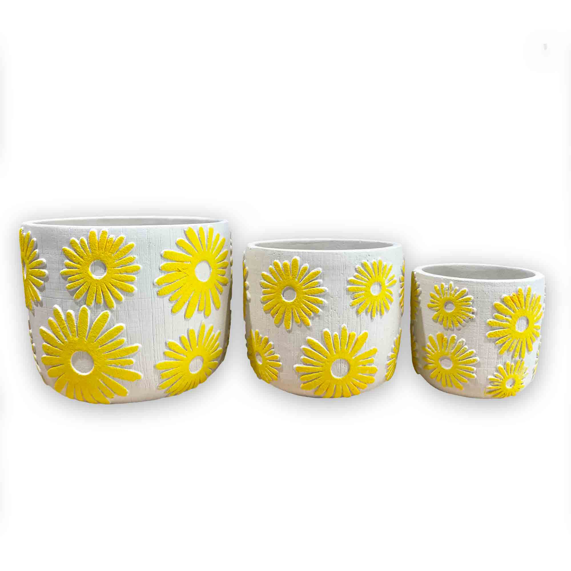 Three ceramic planters with yellow flower designs on a white background