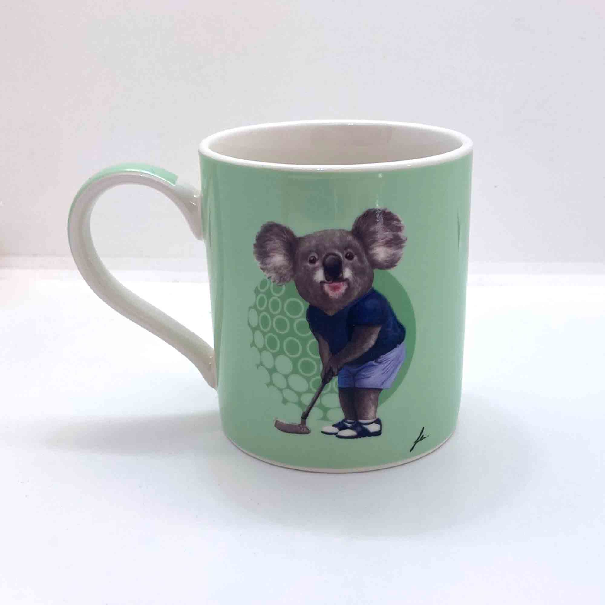 Green mug with a koala design holding a golf club on a white background