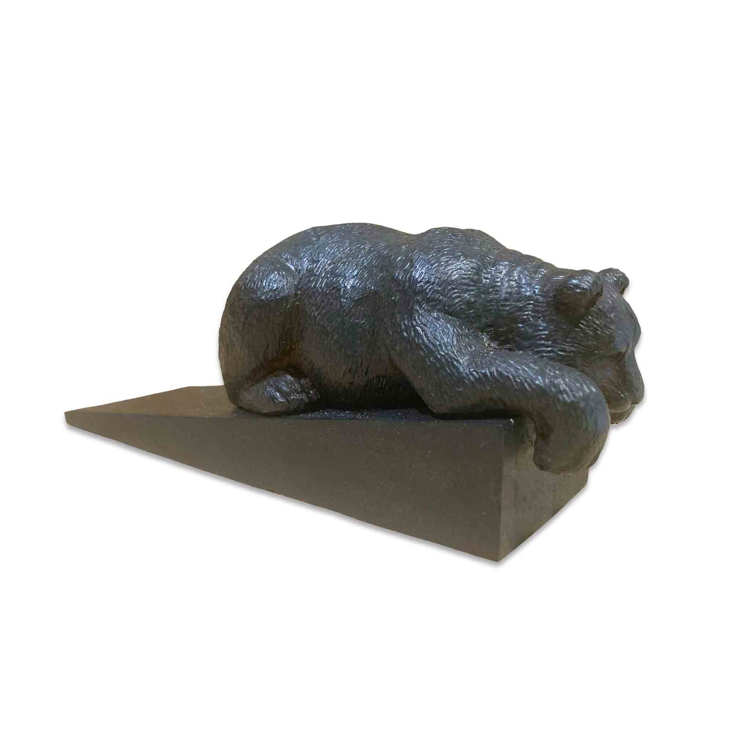 Decorative bear door stopper on a white background