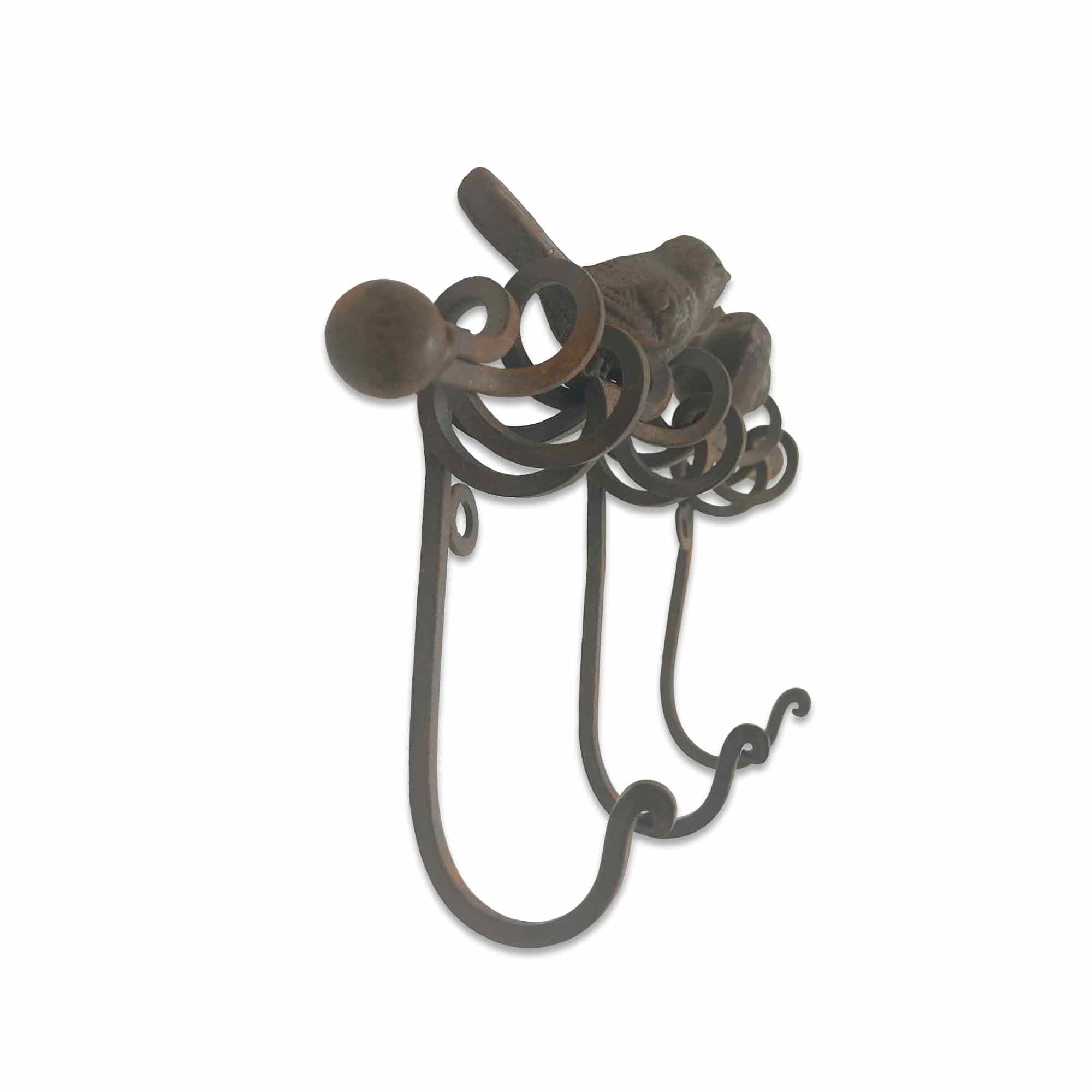 Decorative metal hook on a white background