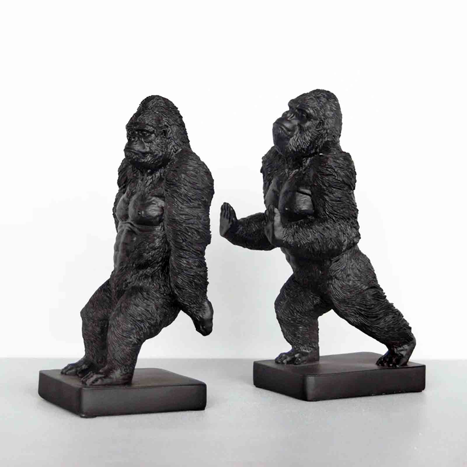 Two gorilla bookends on a white background