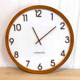 Kensington Wood Wall Clock - Brown timber framed clock with a white face and raised brown numbers.