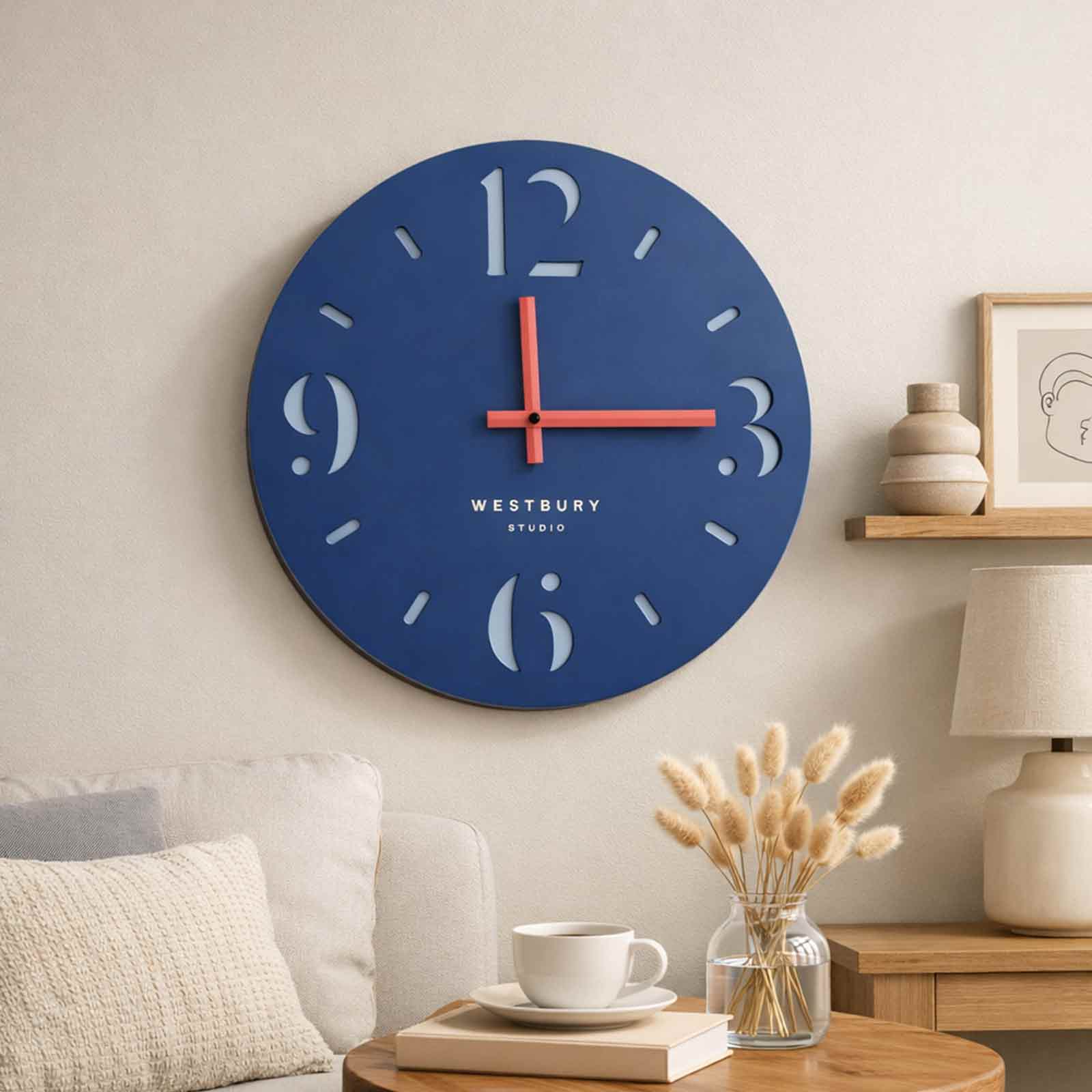 Styled interior featuring blue Westbury Studio clock with natural décor