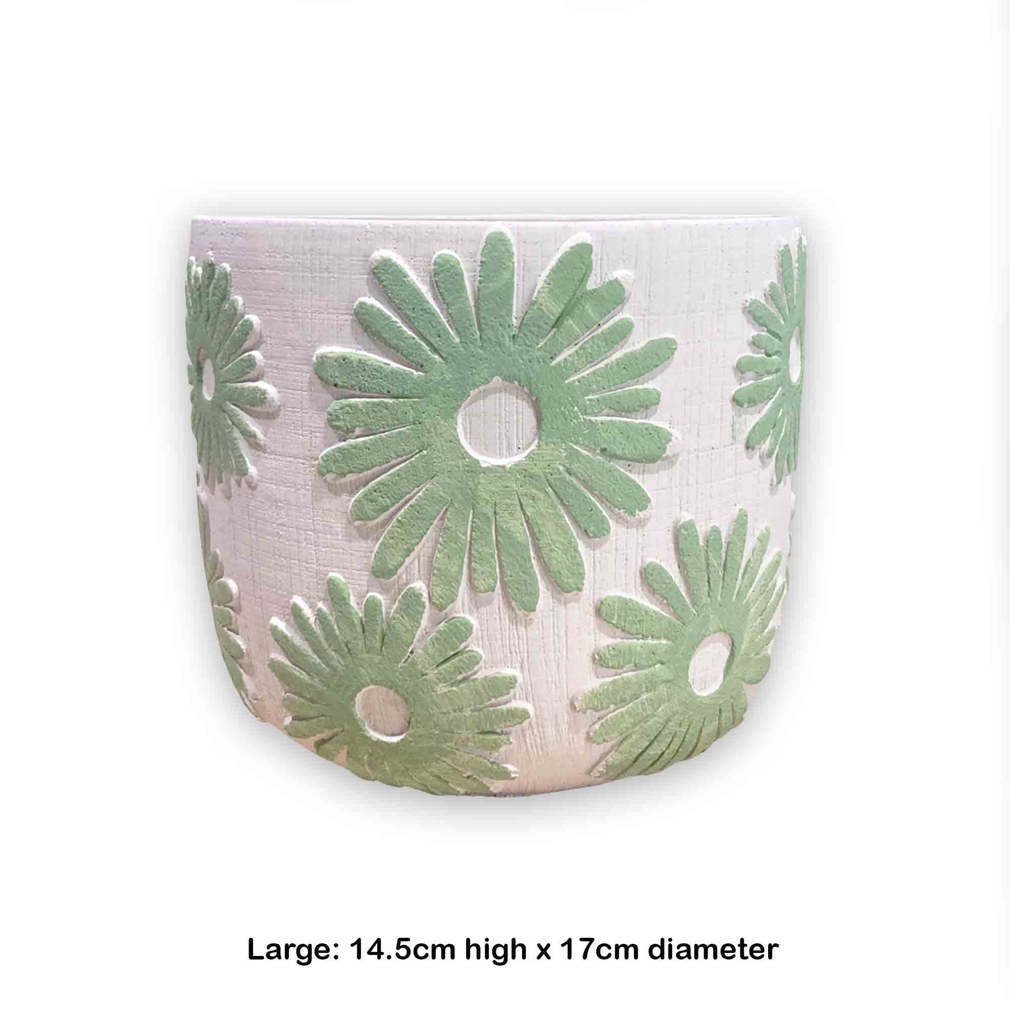 Concrete pot with green floral daisy pattern on a white background