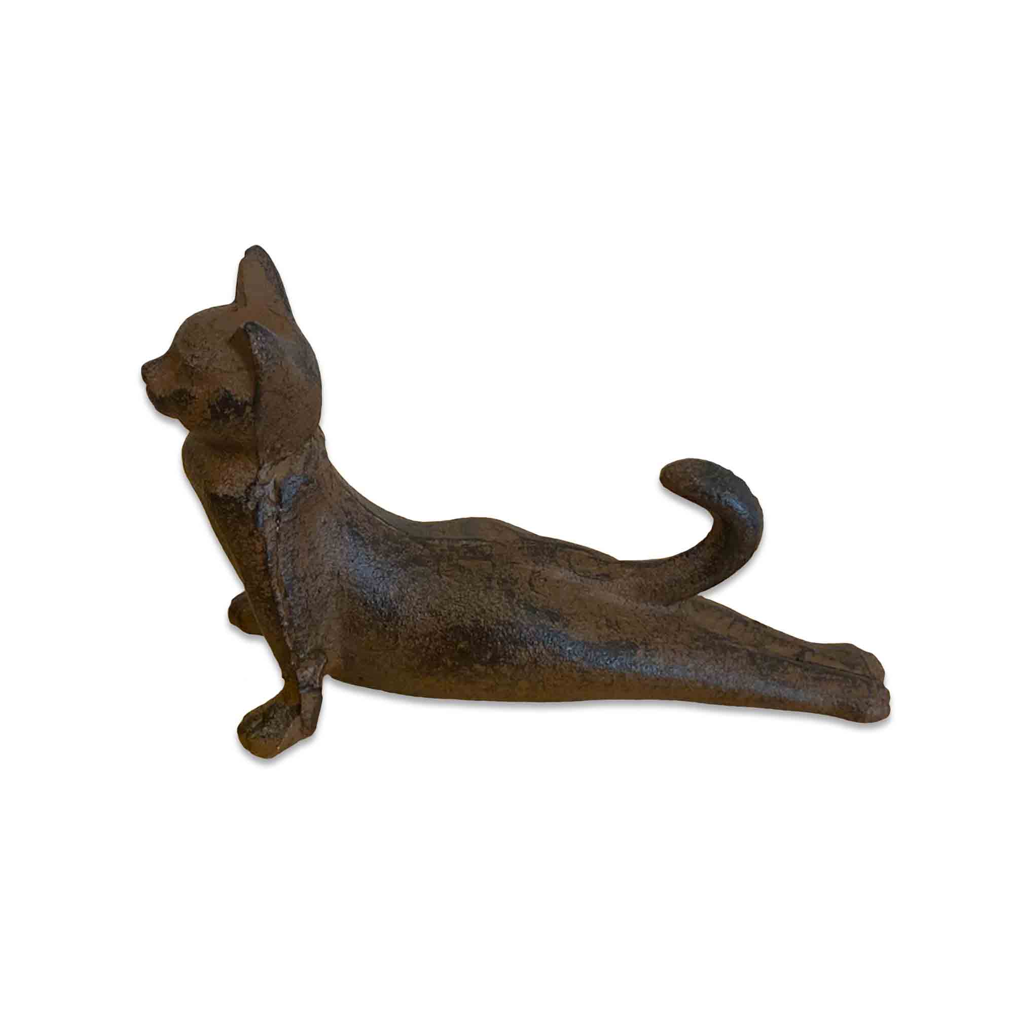 Cast iron cat-shaped door stopper on a white background