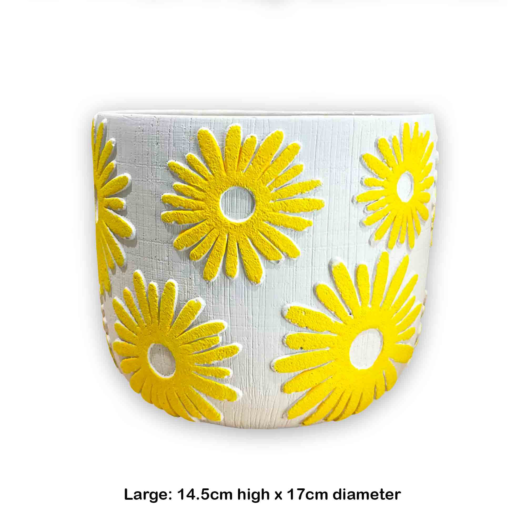 Decorative cement plant pot with yellow flower designs on a white background