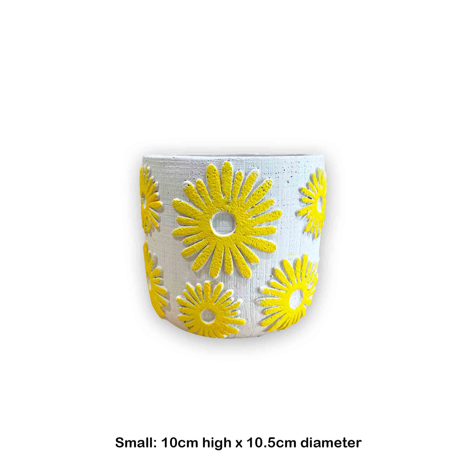 Ceramic planter with yellow floral patterns on a white background