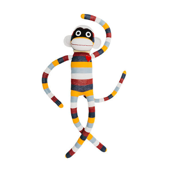 Colorful sock monkey toy on a white background