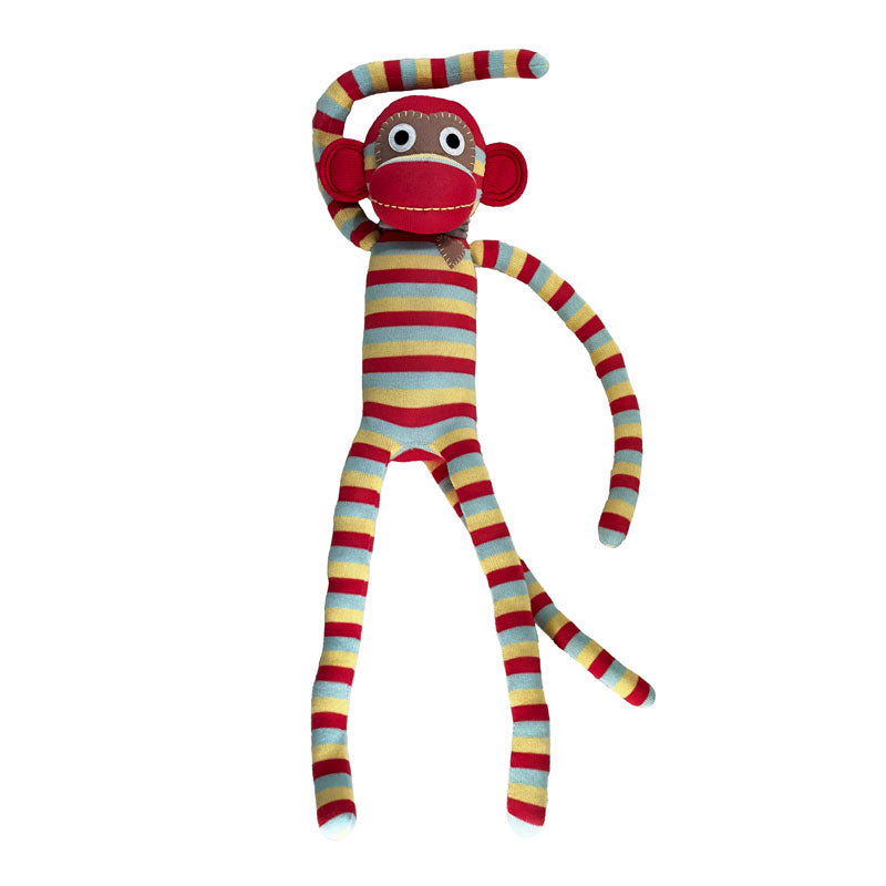 Colorful striped sock monkey toy on a white background