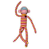Striped monkey toy with a heart on a white background