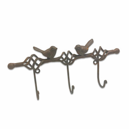 Decorative metal wall hook with bird designs on a white background