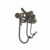 Decorative metal hook on a white background