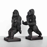 Two gorilla bookends on a white background