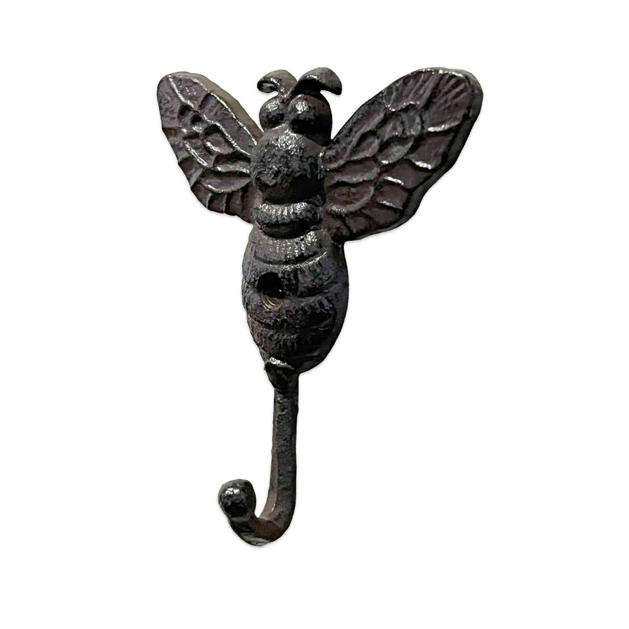 Decorative bee-shaped wall hook on a white background