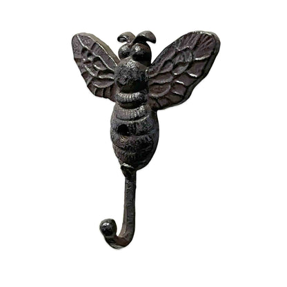 Decorative bee-shaped wall hook on a white background