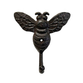 Brown bee-shaped wall hook on a white background