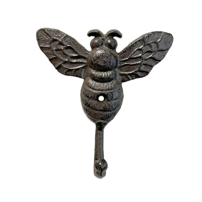 Cast iron bee wall hook on white background