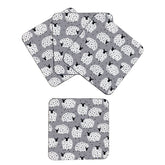 Set of four coasters with a sheep pattern on grey background