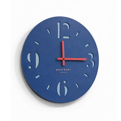 Dark blue cut‑out MDF clock face layered over lighter blue backing