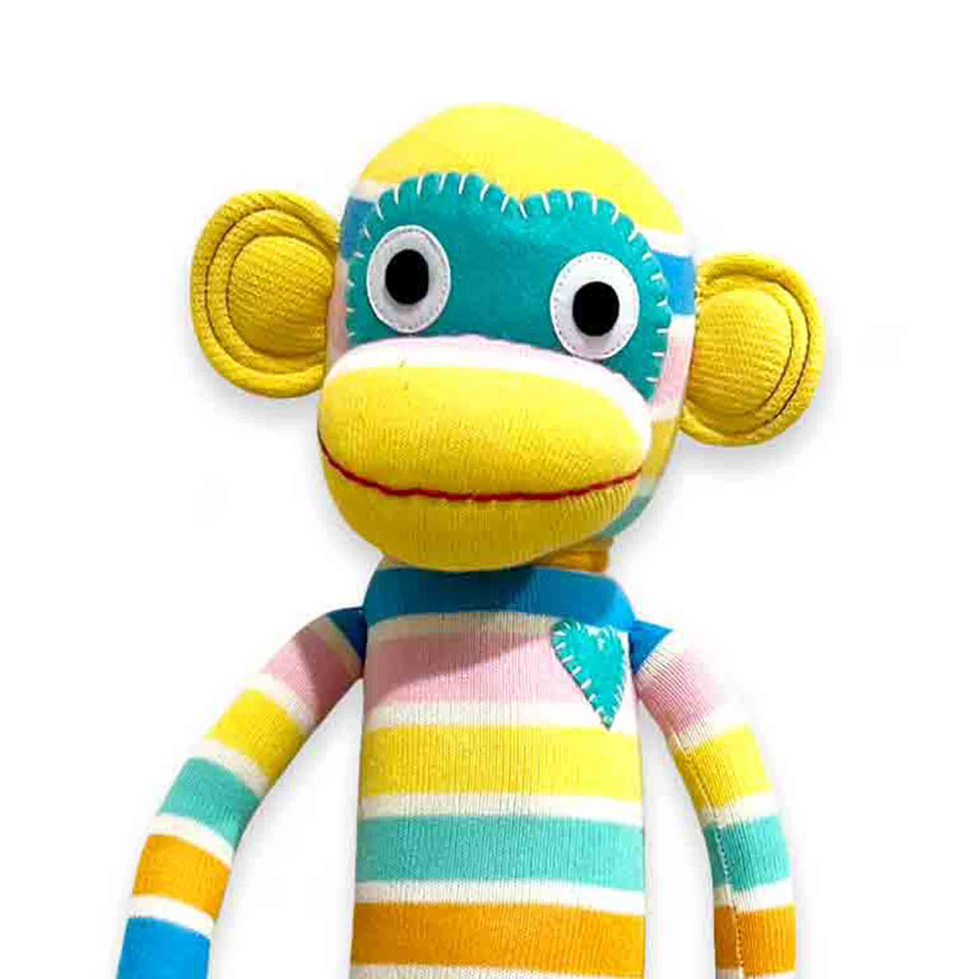 Handmade cotton sock monkey with blue heart patch – Pepper