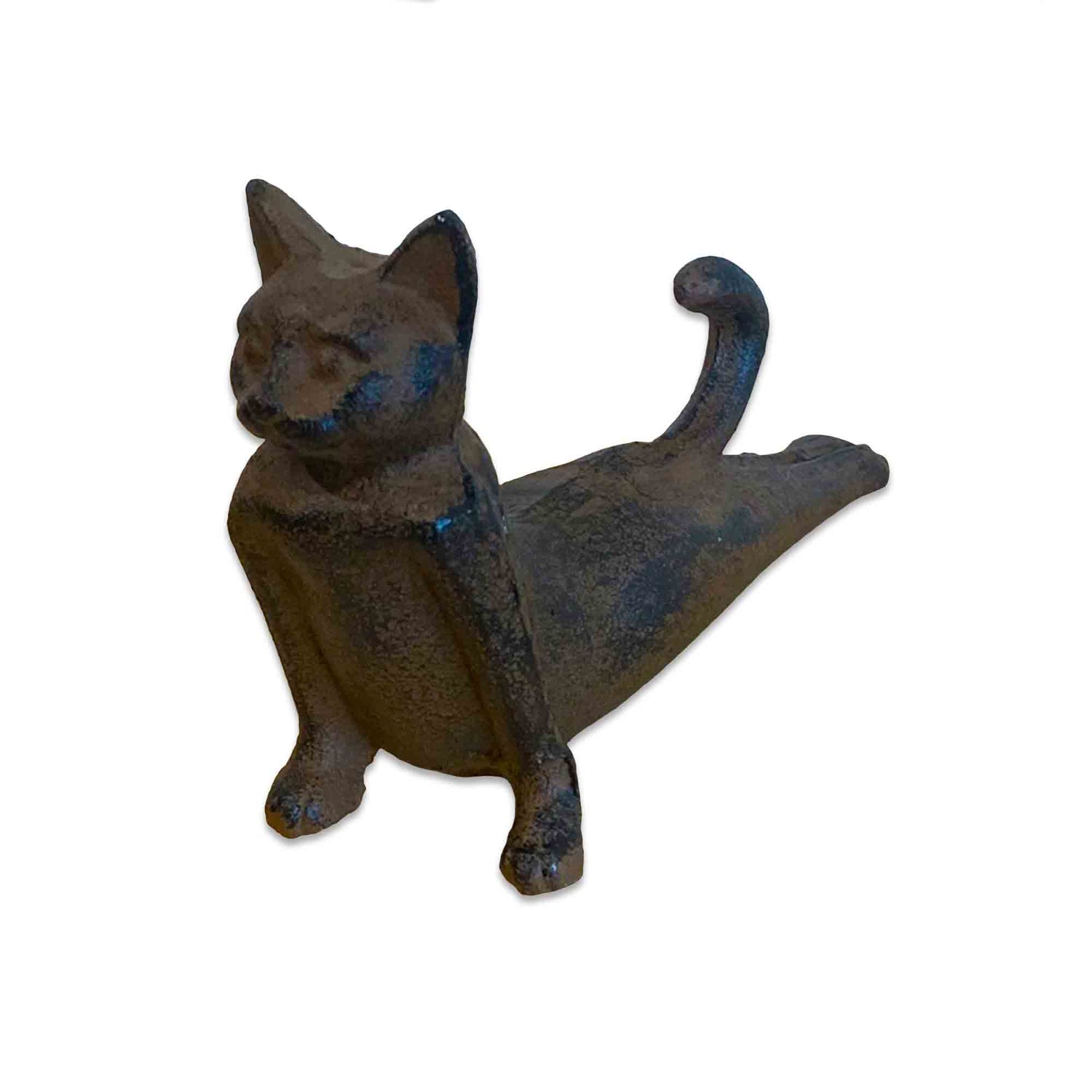 Cast iron cat-shaped door stopper on a white background