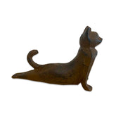 Cast iron cat-shaped door stopper on a white background