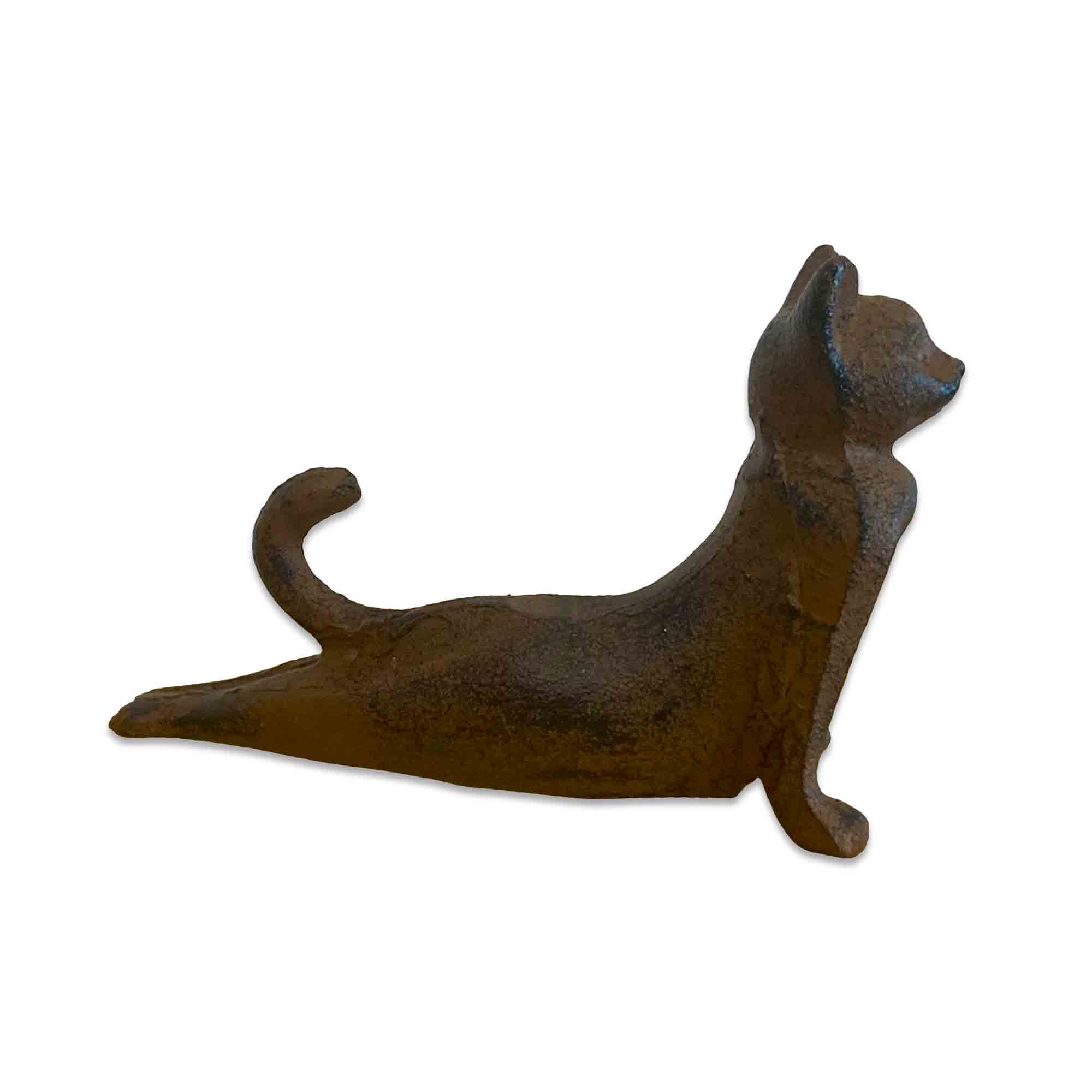Cast iron cat-shaped door stopper on a white background