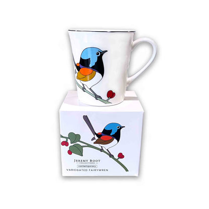 Mug with bird design in a matching box on a white background