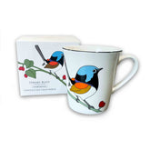 Mug with bird design and packaging on a white background