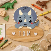 Customisable personalised name wooden door sign featuring a blue grey dinosaur