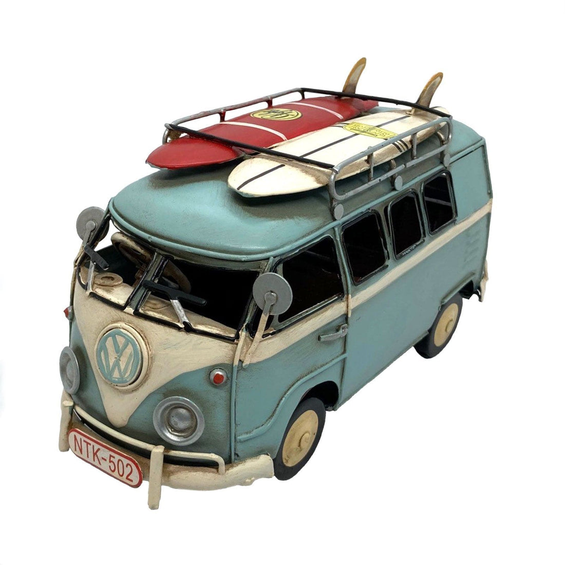 Blue VW Kombi with Surfboards