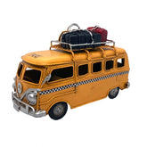 Yellow Kombi Taxi with Suitcases